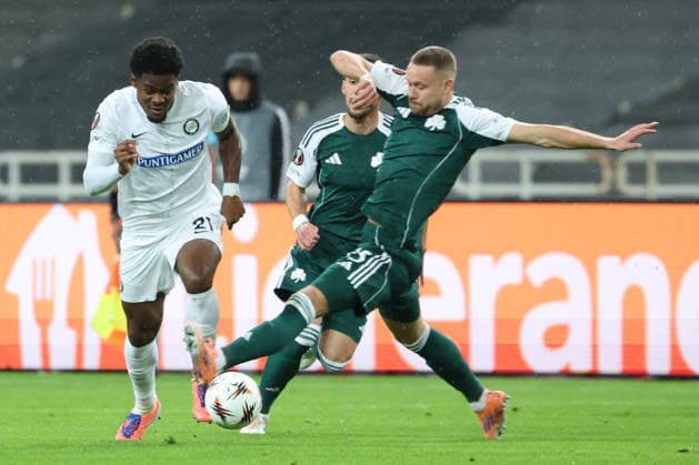 SOCCER - UEFA EL, Panathinaikos vs Sturm GRAZ,AUSTRIA,27.NOV.25 - SOCCER - UEFA Europa League, Panathinaikos Athen vs SK Sturm Graz. Image shows Tochi Phil Chukwuani (Sturm) and Filip Mladenovic (Panathinaikos).  GEPAxpictures xChrisxBauer
