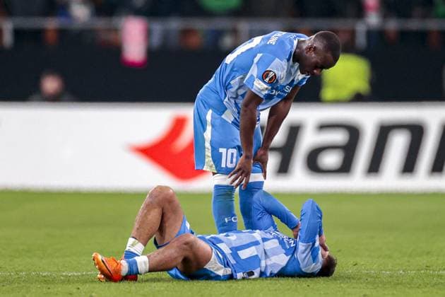 SEVILLA, 27-11-2025, Stadium La Cartuja, UEFA Football season 2025 2026, Europa League match between Betis Sevilla and FC Utrecht. Pictures shows FC Utrecht player Souffian El Karouani has a injury and FC Utrecht player Yoann Cathline Betis Sevilla - Utrecht  x32221080x Copyright:
