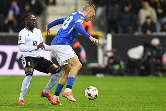 FC Basel s Benie Traore and Genk s Daan Heymans pictured in action during a soccer game between Belgian KRC Genk and Swiss FC Basel, on Thursday 27 November 2025, in Genk, on the fifth game (out of 8) in the league phase of the UEFA Europa League competition. JILLxDELSAUX  x144746544x