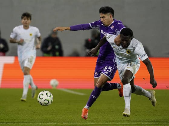 Fiorentina™s Fabiano Parisi fight for the ball with Aek™s Aboubakary Koita during the UEFA Conference League soccer match between Fiorentina and Aek Atene at Artemio Franchi stadium in Florence, Italy - Thursday, November 27, 2025.  Copyright: xMarcoxBucco LaxPressex