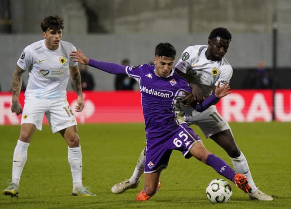 Fiorentina™s Fabiano Parisi fight for the ball with Aek™s Aboubakary Koita during the UEFA Conference League soccer match between Fiorentina and Aek Atene at Artemio Franchi stadium in Florence, Italy - Thursday, November 27, 2025.  Copyright: xMarcoxBucco LaxPressex