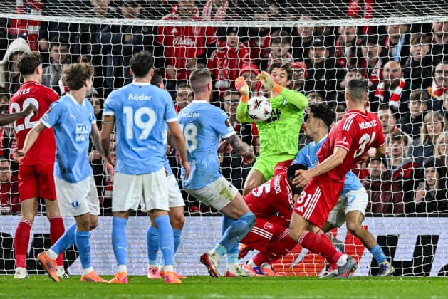 27th November 2025; The City Ground, Nottingham, England; UEFA Europa League Football, Nottingham Forest versus Malmo FF; Melker Ellborg of Malmo saves from a header by Nikola Milenkovic of Nottingham Forest  GodfreyxPitt