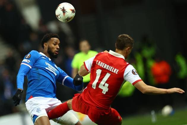 Youssef Chermiti of Rangers and Gustaf Lagerbielke of Braga during the Europa League league phase match at Ibrox Stadium, Glasgow. Rangers v Braga - UEFA Europa League - League Phase - Ibrox Stadium, Glasgow, Lanarkshire, Scotland, UK - 27 Nov 2025Glasgow Ibrox Lanarkshire United Kingdom  Copyright: xO Rourke RangersxFC Shutterstockx 15953532ar
