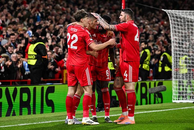 27th November 2025; The City Ground, Nottingham, England; UEFA Europa League Football, Nottingham Forest versus Malmo FF; Nikola Milenkovic of Nottingham Forest celebrates with his team after scoring in the 59th minute to make the score 3-0  GodfreyxPitt