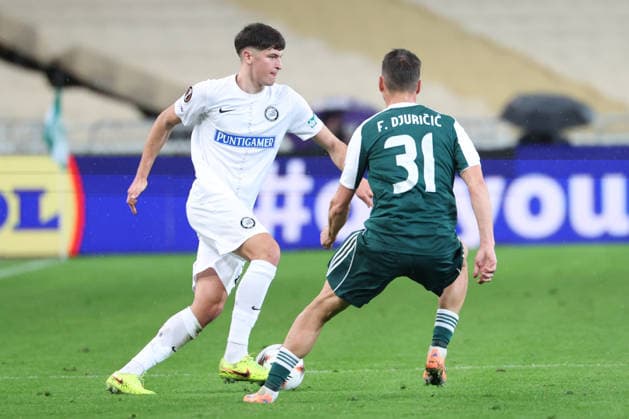 SOCCER - UEFA EL, Panathinaikos vs Sturm GRAZ,AUSTRIA,27.NOV.25 - SOCCER - UEFA Europa League, Panathinaikos Athen vs SK Sturm Graz. Image shows Arjan Malic (Sturm) and Filip Djuricic (Panathinaikos).  GEPAxpictures xChrisxBauer