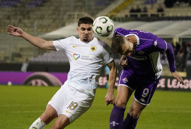 Fiorentina™s Edin Dzeko fight for the ball with Aek™s Razvan Marin during the UEFA Conference League soccer match between Fiorentina and Aek Atene at Artemio Franchi stadium in Florence, Italy - Thursday, November 27, 2025.  Copyright: xMarcoxBucco LaxPressex