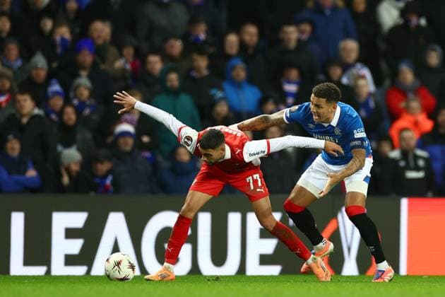 Gabri Martinez of Braga battles for the ball with Rangers captain James Tavernier during the Europa League league phase match at Ibrox Stadium, Glasgow. Rangers v Braga - UEFA Europa League - League Phase - Ibrox Stadium, Glasgow, Lanarkshire, Scotland, UK - 27 Nov 2025Glasgow Ibrox Lanarkshire United Kingdom  Copyright: xO Rourke RangersxFC Shutterstockx 15953532be