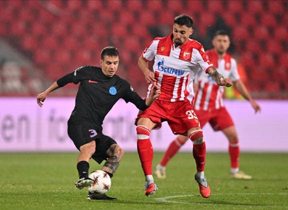 CRVENA ZVEZDA vs FCSB STEAUA BUCHAREST JURI CISOTTI vs RADE KRUNIC football Crvena zvezda vs FCSB Steaua Bucharest during UEFA Europa league match at Rajko Mitic stadium, Belgrade 27.11.2025 Foto: FOOTBALL, UEFA EUROPA LEAGUE, CRVENA ZVEZDA, RED STAR, FCSB STEAUA BUCHAREST Belgrade Rajko Mitic stadium Serbia Copyright: xMarkoxMetlas xMNxPressx