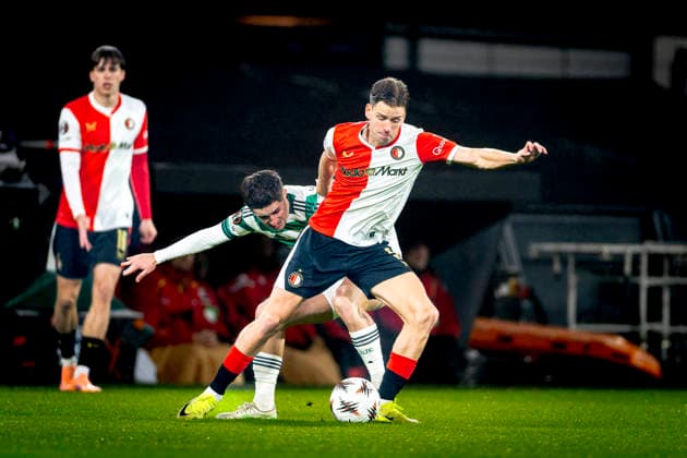 Celtic FC midfielder Luke McCowan, SC Feyenoord Rotterdam defender Gijs Smal during the match SC Feyenoord Rotterdam vs Celtic FC at the Feyenoord stadium De Kuip for the Europa League League phase Matchday 5 season 2025 2026 in ROTTERDAM, Netherlands on 27 november 2025, photo by Marcel van Dorst EYE4images DeFodi Images