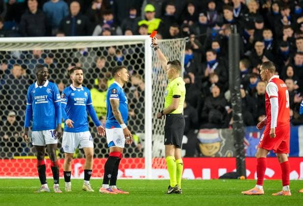 Referee Allard Lindhout shows a red card to Mohamed Diomande of Rangers, far left, sending him off for a second yellow card offence. Rangers v Braga, UEFA Europa League, Group Stage, Football, Ibrox Stadium, Glasgow, Scotland, UK - 27 Nov 2025Glasgow Ibrox Scotland United Kingdom EDITORIAL USE ONLY No use with unauthorised audio, video, data, fixture lists, club league logos or live services. Online in-match use limited to 120 images, no video emulation. No use in betting, games or single club league player publications.  Copyright: xStuartxWallace Shutterstockx 15928082bv