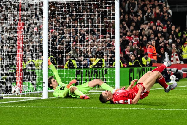 27th November 2025; The City Ground, Nottingham, England; UEFA Europa League Football, Nottingham Forest versus Malmo FF; Nikola Milenkovic of Nottingham Forest falls to the ground after scoring in the 59th minute for 3-0  GodfreyxPitt