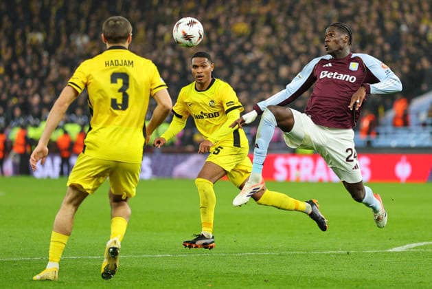 Birmingham, England, 27th November 2025. Amadou Onana of Aston Villa and Jaouen Hadjam of Young Boys during the Aston Villa vs Young Boys UEFA Europa League match at Villa Park, Birmingham. Picture credit should read: James Baylis Sportimage EDITORIAL USE ONLY. No use with unauthorised audio, video, data, fixture lists, club league logos or live services. Online in-match use limited to 120 images, no video emulation. No use in betting, games or single club league player publications. SPI_046_JB_VILLA_YOUNGBOYS SPI-4329-0047