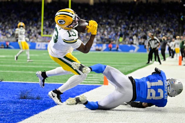 November 27, Detroit, Michigan, USA: Green Bay Packers WR DONTAYVION WICKS (13) catches a touchdown pass during the game between Green Bay Packers and Detroit Lions at Ford Field in Detroit. Detroit USA - ZUMAc04_ 20251127_zma_c04_006 Copyright: xAllanxDranbergx