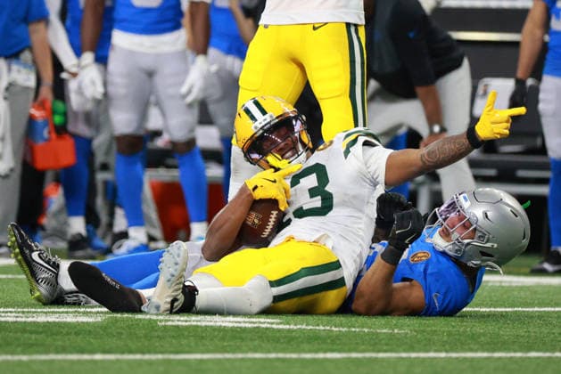Green Bay Packers vs Detroit Lions DETROIT,MICHIGAN-NOVEMBER 27: Green Bay Packers wide receiver Dontayvion Wicks 13 reacts after catching a pass during the second half of an NFL, American Football Herren, USA football game between the Green Bay Packers and the Detroit Lions in Detroit, Michigan USA, on Thursday, November 27, 2025 Detroit Michigan United States  Copyright: xJorgexLemusx originalFilename:lemus-greenbay251127_npDTP.jpg