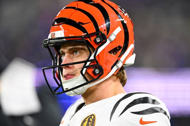 After missing nine games because of a turf-toe injury he suffered in Week 2, Cincinnati Bengals quarterback Joe Burrow (9) enters the game against the Baltimore Ravens during the first quarter at M&T Bank Stadium in Baltimore, Maryland, on Thursday, November 27 2025.  BAL20251127137 DAVIDxTULIS