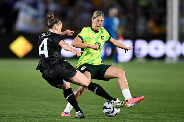 SOCCER AUSTRALIA NEW ZEALAND WOMEN, CJ Bott of New Zealand competes for possession with Kyra Cooney-Cross of the Matildas during the national anthems ahead of theInternational Women s friendly match between between Australia and New Zealand at Polytec Stadium in Gosford, Friday, November 28, 2025. ( NO ARCHIVING, EDITORIAL USE ONLY GOSFORD NEW SOUTH WALES AUSTRALIA  Copyright: xDANxHIMBRECHTSx 20251128164839845610