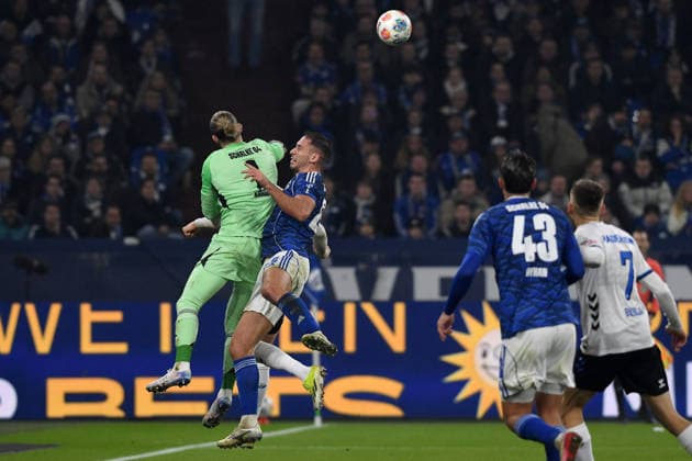Goalkeeper Loris Karius FC Schalke 04 and Nikola Katic FC Schalke 04 battle for the ball during the 2 Bundesliga match between FC Schalke 04 and SC Paderborn 07, Veltins Arena on November 28, 2025 in Gelsenkirchen, Germany, Germany Photo by Ralf Treese DeFodi Images Goalkeeper Loris Karius FC Schalke 04 and Nikola Katic FC Schalke 04 battle for the ball during the 2 Bundesliga match between FC Schalke 04 and SC Paderborn 07 at Veltins Arena on November 28, 2025 in Gelsenkirchen, Germany Photo by Ralf Treese DeFodi Images Photo by Ralf Treese DeFodi Images