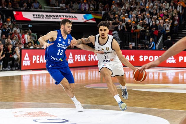 GER, FIBA Basketball World Cup 2027, European Qualifiers, Germany Israel 28 11 2025, Ratiopharm Arena, Neu Ulm, GER, FIBA Basketball World Cup 2027, European Qualifiers, Germany Israel Joshua Obiesie Germany, No77 , Yair Kravits Israel, No33 Â Photo Alexander Trienitz Neu Ulm Ratiopharm Arena Bayern Germany