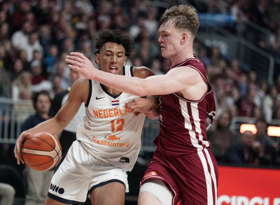 basketball, FIBA, World Cup Qualifiers, Latvia, Netherlands Yannick Kraag and Marcis Steinbergs in action during FIBA 2027 World Cup Qualifiers basketball game Latvia vs Netherlands in Riga, Latvia 28.11.2025. Photo: Roman Koksarov Riga Latvia Copyright: xRomanxKoksarovx RKO04298.JPG