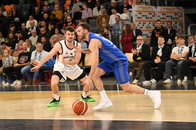 Jonas Mattisseck 15 Germany and Roi Huber 13 Israel in action at the Basketball World Cup qualifying match between Germany and Israel on November 28, 2025, in Neu Ulm Neu Ulm ratiopharm Arena Bavaria Germany