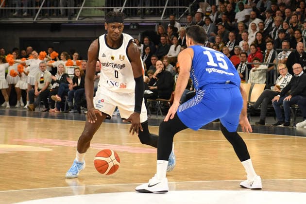 Isaac Bonga 0 Germany and Lior Carreira 15 Israel in action at the Basketball World Cup qualifying match between Germany and Israel on November 28, 2025, in Neu Ulm Neu Ulm ratiopharm Arena Bavaria Germany