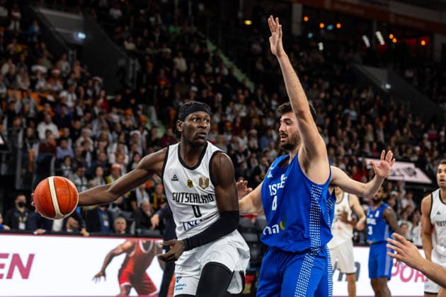 GER, FIBA Basketball World Cup 2027, European Qualifiers, Germany Israel 28 11 2025, Ratiopharm Arena, Neu Ulm, GER, FIBA Basketball World Cup 2027, European Qualifiers, Germany Israel Isaac Bonga Germany, No0 , Gur Lavi Israel, No 4 Â Photo Alexander Trienitz Neu Ulm Ratiopharm Arena Bayern Germany