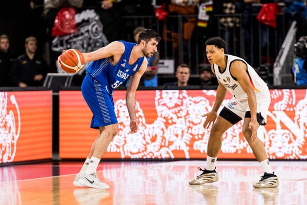NEU-ULM, GERMANY - NOVEMBER 28: Yovel Zoosman (Israel, 50) controls the ball against Jack Kayil (Germany, 2) during the FIBA World Cup European Qualifiers match between Germany vs. Israel at Ratiopharm Arena on matchday 1 of the FIBA World Cup European Qualifiers on November 28, 2025 in Neu-Ulm, Germany. Baden-Württemberg Germany Copyright: xBEAUTIFULxSPORTS Wunderlx