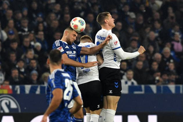 Hasan Kurucay FC Schalke 04 and Steffen Tigges SC Paderborn 07 battle for the ball during the 2 Bundesliga match between FC Schalke 04 and SC Paderborn 07, Veltins Arena on November 28, 2025 in Gelsenkirchen, Germany, Germany Photo by Ralf Treese DeFodi Images Hasan Kurucay FC Schalke 04 and Steffen Tigges SC Paderborn 07 battle for the ball during the 2 Bundesliga match between FC Schalke 04 and SC Paderborn 07 at Veltins Arena on November 28, 2025 in Gelsenkirchen, Germany Photo by Ralf Treese DeFodi Images Photo by Ralf Treese DeFodi Images