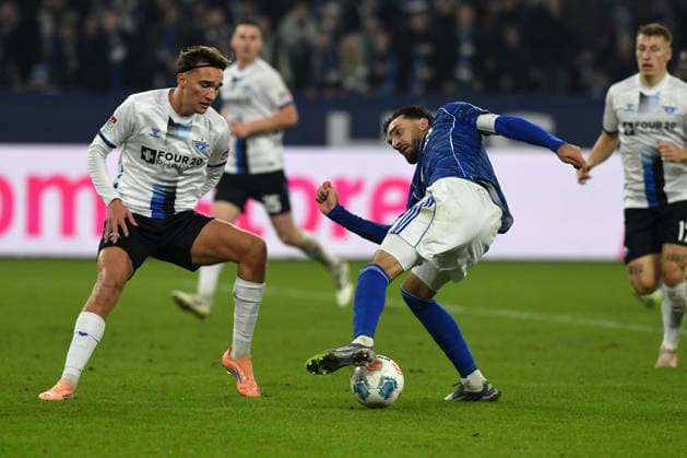 Luis Engelns SC Paderborn 07 and Kenan Karaman FC Schalke 04 in a duel during the 2 Bundesliga match between FC Schalke 04 and SC Paderborn 07, Veltins Arena on November 28, 2025 in Gelsenkirchen, Germany, Germany Photo by Ralf Treese DeFodi Images Luis Engelns SC Paderborn 07 and Kenan Karaman FC Schalke 04 battle for the ball during the 2 Bundesliga match between FC Schalke 04 and SC Paderborn 07 at Veltins Arena on November 28, 2025 in Gelsenkirchen, Germany Photo by Ralf Treese DeFodi Images Photo by Ralf Treese DeFodi Images