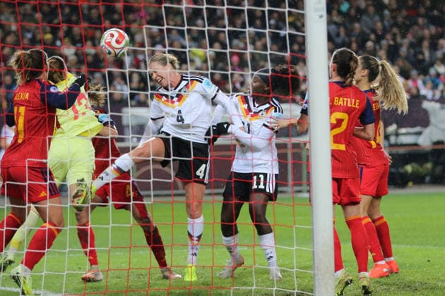28 11 2025 Football Women 2025 2026 UEFA Women s Nations League Final First leg Germany Spain Fritz Walter Stadion Kaiserslautern Cata Coll ESP, yellow just manages to clear a header from Rebecca Knaak GER, white, 4 Kaiserslautern Rhineland-Palatinate Germany