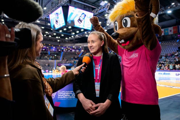 Handball, Womens World Championship, Group C Uruguay Germany Saskia Lang interviewed by ZDF, mascot Hanni Stuttgart Porsche Arena Baden Württemberg Germany