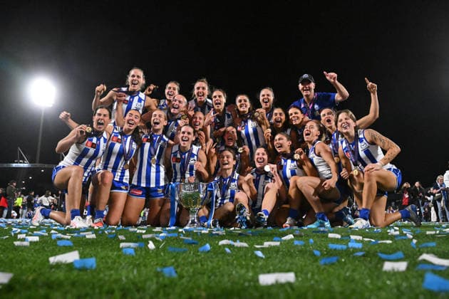 AFLW GRAND FINAL, Kangaroos players and Darren Crocker, Senior Coach of the Kangaroos celebrate with the trophy after defeating the Brisbane Lions to win the AFLW Grand Final match between the North Melbourne Kangaroos and the Brisbane Lions at Ikon Park in Melbourne, Saturday, November 29, 2025. ( NO ARCHIVING, EDITORIAL USE ONLY MELBOURNE VICTORIA AUSTRALIA  Copyright: xJAMESxROSSx 20251129139007826159