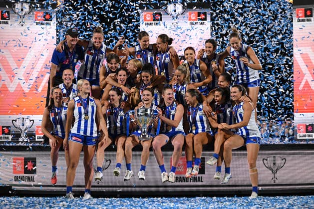 AFLW GRAND FINAL, Kangaroos players and Darren Crocker, Senior Coach of the Kangaroos celebrate on stage with the trophy after defeating the Brisbane Lions to win the AFLW Grand Final match between the North Melbourne Kangaroos and the Brisbane Lions at Ikon Park in Melbourne, Saturday, November 29, 2025. ( NO ARCHIVING, EDITORIAL USE ONLY MELBOURNE VICTORIA AUSTRALIA  Copyright: xJAMESxROSSx 20251129142679614086