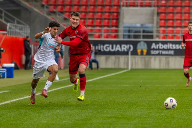 Ingolstadt, Germany 29 November 2025 3 Liga 2025 2026 FC Ingolstadt 04 vs TSG 1899 Hoffenheim II In the picture from left in a duel Ayoube Amaimouni Echghouyab TSG II and Jonas Scholz FCI DFB regulations prohibit any use of photographs as image sequences and or quasi video Audi Sportpark Bayern Copyright: xFotostandx xSchäferx
