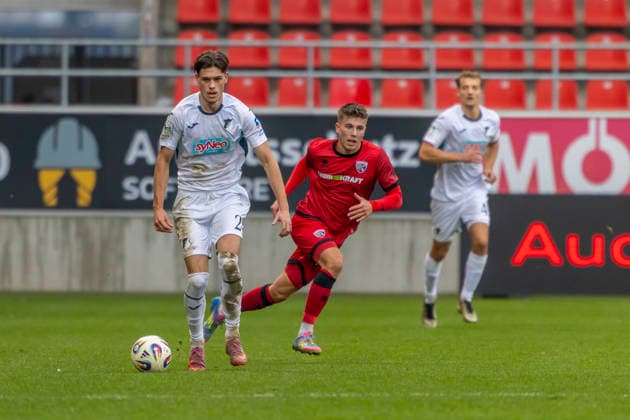 Ingolstadt, Germany 29 November 2025 3 Liga 2025 2026 FC Ingolstadt 04 vs TSG 1899 Hoffenheim II In the picture from left in a duel Luca Erlein TSG II and Gustav Christensen FCI DFB regulations prohibit any use of photographs as image sequences and or quasi video Audi Sportpark Bayern Copyright: xFotostandx xSchäferx