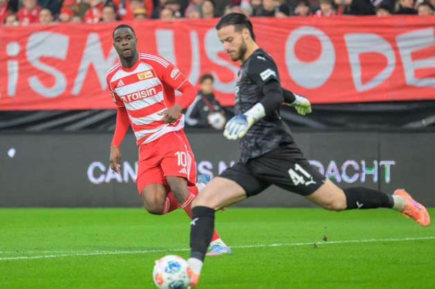 in the picture from l Ilyas Ansah 1 FC Union , Diant Ramaj FCH, 41 , duel, action, fight, fights for the ball, Action, duels, fighting for the ball, GER, Berlin, 1 FC Union Berlin vs 1 FC Heidenheim 1846, 1 Bundesliga, Football, DFB, Season 2025 2026, Alte Foersterei, Matchday 12, DFB DFL REGULATIONS PROHIBIT ANY USE OF PHOTOGRAPHS AS IMAGE SEQUENCES AND OR QUASI VIDEO, 29 11 25, Copyright: HMBxMedia UwexKoch