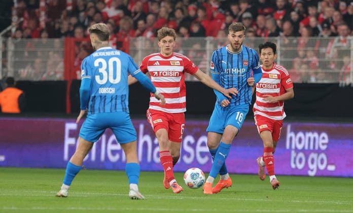 Niklas Dorsch, Aljoscha Kemlein, Julian Niehues duel Match scene Action Sport Football Soccer Bundesliga Men DFL 12 Matchday Season 2025 2026 29 11 2025 1 FC Union Berlin FCU vs 1 FC Heidenheim FCH DFL regulations prohibit any use of photographs as image sequences and or quasi video