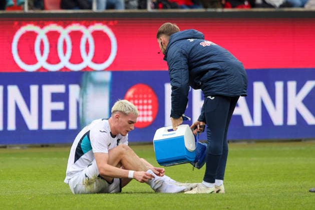 Paul Hennrich TSG Hoffenheim II, Nr 11 must be treated briefly on the pitch, can continue playing in the match FC Ingolstadt 04 vs TSG Hoffenheim II, Soccer on 29 11 2025, DFB regulations prohibit any use of photographs as image sequences and or quasi video GER, Soccer, 3 Liga, Matchday 16, 1 FC Ingolstadt vs TSG Hoffenheim II, Soccer, 29 11 2025, Audi Sportpark Ingolstadt Copyright: xEibner-Pressefoto OliverxSTRISCHx EP-OSH