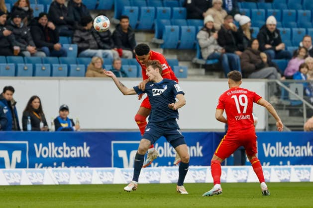 Noahkai Banks FC Augsburg, 40 and Wouter Burger TSG Hoffenheim, 18 in duel , Germany, Soccer, 1 Bundesliga, Matchday 12, 2025 2026, TSG Hoffenheim vs FC Augsburg, 29 11 2025, PreZero Arena, Sinsheim, Germany Sinsheim PreZero Arena Baden Württemberg Germany Copyright: xGrantxHubbsx