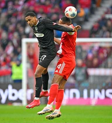 29 11 2025, Soccer Bundesliga 2025 2026, Matchday 12, FC Bayern Munich FC St Pauli, at the Allianz Arena Munich, v l AndreasÊHountondji FC St Pauli vs Jonathan Tah FC Bayern Munich DFL and DFB regulations prohibit any use of photographs as image sequences and or quasi video