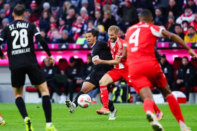 Konrad Laimer 27, FC Bayern München and Joel Chima Fujita 16, FC St Pauli at the match between FC Bayern München v FC St Pauli, Football, Men, Bundesliga, 2025 2026, Matchday 12 on 29 11 2025 in Munich, Allianz Arena DFL and DFB regulations prohibit any use of photographs as image sequences and or quasi video Bayern Germany
