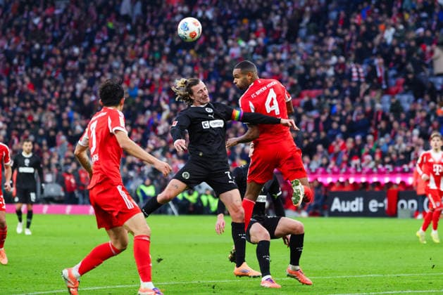 Jackson Irvine 7, FC St Pauli and Jonathan Tah 4, FC Bayern München at the match between FC Bayern München v FC St Pauli, Football, Men, Bundesliga, 2025 2026, Matchday 12 on 29 11 2025 in Munich, Allianz Arena DFL and DFB regulations prohibit any use of photographs as image sequences and or quasi video Bayern Germany