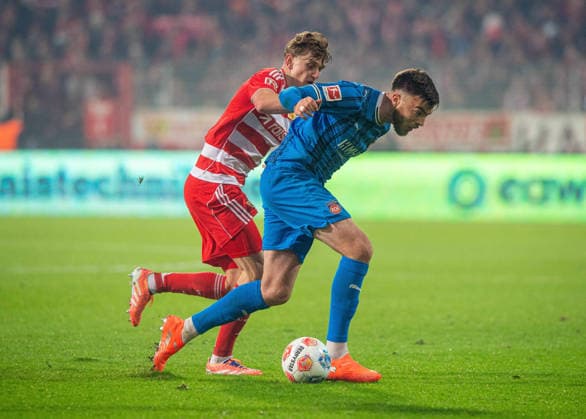 Soccer, Men, Season 2025 2026, 1 Bundesliga 12 Matchday , 1 FC Union Berlin 1 FC Heidenheim, v l Aljoscha Kemlein 1 FC Union Berlin , Julian Niehues Heidenheim , 29 11 2025, Copyright: xSebastianxRäppold MatthiasxKochx