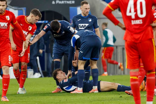 Fisnik Asllani TSG Hoffenheim, 11 injured on the ground , Germany, Football, 1 Bundesliga, Matchday 12, 2025 2026, TSG Hoffenheim vs FC Augsburg, 29 11 2025, PreZero Arena, Sinsheim, Germany Sinsheim PreZero Arena Baden Württemberg Germany Copyright: xGrantxHubbsx