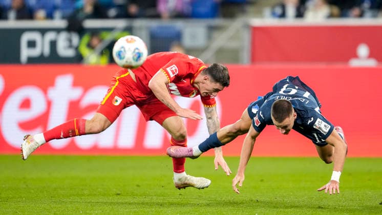 v li Cedric Zesiger FCA, 16 , Tim Lemperle Hoffenheim, 19 , duel, duel, tackle, tackling, dynamics, action, action, 29 11 2025, Sinsheim Germany , Football, Bundesliga, TSG 1899 Hoffenheim FC Augsburg, DFB DFL REGULATIONS PROHIBIT ANY USE OF PHOTOGRAPHS AS IMAGE SEQUENCES AND OR QUASI VIDEO xozx
