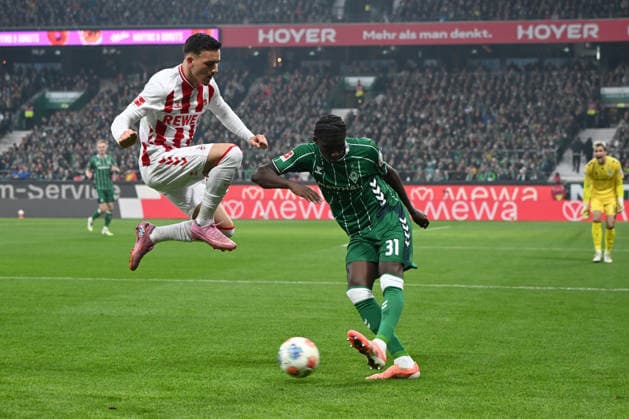 Said El Mala 1 FC Koeln and Karim Coulibaly Werder Bremen battle for the ball during the Bundesliga match between Werder Bremen and 1 FC Köln, Weserstadion on November 29, 2025 in Bremen, Germany Photo by Ralf Treese DeFodi Images Said El Mala 1 FC Koeln and Karim Coulibaly Werder Bremen battle for the ball during the Bundesliga match between Werder Bremen and 1 FC Köln at Weserstadion on November 29, 2025 in Bremen, Germany Photo by Ralf Treese DeFodi Images DFL regulations prohibit any use of photographs as image sequences and or quasi video Photo by Ralf Treese DeFodi Images