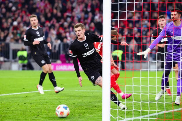 Eric Smith 8, FC St Pauli at the match between FC Bayern Munich v FC St Pauli, Football, Men, Bundesliga, 2025 2026, Matchday 12 on 29 11 2025 in Munich, Allianz Arena DFL and DFB regulations prohibit any use of photographs as image sequences and or quasi video Bayern Germany