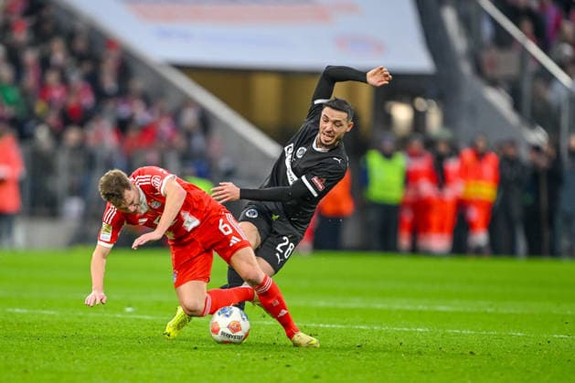 Joshua Kimmich Bayern Munich and Mathias Pereira Lage FC St Pauli in a duel during the Bundesliga match between FC Bayern Munich and FC St Pauli, Allianz Arena on November 29, 2025 in Munich, Germany Photo by Harry Langer DeFodi Images Joshua Kimmich Bayern Munich and Mathias Pereira Lage FC St Pauli battle for the ball during the Bundesliga match between FC Bayern Munich and FC St Pauli at Allianz Arena on November 29, 2025 in München, Germany Photo by Harry Langer DeFodi Images DFL regulations prohibit any use of photographs as image sequences and or quasi video Photo by Harry Langer DeFodi Images DFL regulations prohibit any use of photographs as image sequences and or quasi video