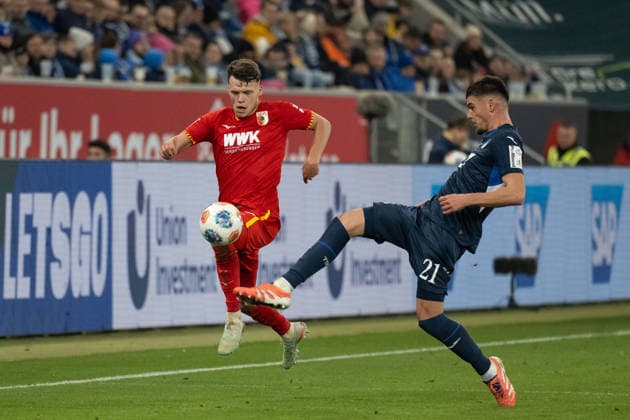 from left in duel Robin Fellhauer FC Augsburg, 19 , Albian Hajdari TSG 1899 Hoffenheim, 21 GER, TSG 1899 Hoffenheim vs FC Augsburg, Football, Men, 1 Bundesliga, Matchday 12, Season 2025 2026, 29 11 2025, DFL DFB REGULATES PROHIBIT ANY USE OF PHOTOGRAPHS AS IMAGE SEQUENCES AND OR QUASI VIDEO, GER, TSG 1899 Hoffenheim vs FC Augsburg, Football, Men, 1 Bundesliga, Matchday 12, Season 2025 2026, 29 11 2025 Sinsheim Copyright: xEibner-Pressefoto WolfgangxFrankx EP_WFK