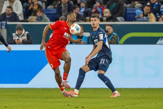 Samuel Essende FC Augsburg, 09 and Albian Hajdari TSG Hoffenheim, 21 fighting for the ball , Germany, Football, 1 Bundesliga, Matchday 12, 2025 2026, TSG Hoffenheim vs FC Augsburg, 29 11 2025, PreZero Arena, Sinsheim, Germany Sinsheim PreZero Arena Baden Württemberg Germany Copyright: xGrantxHubbsx